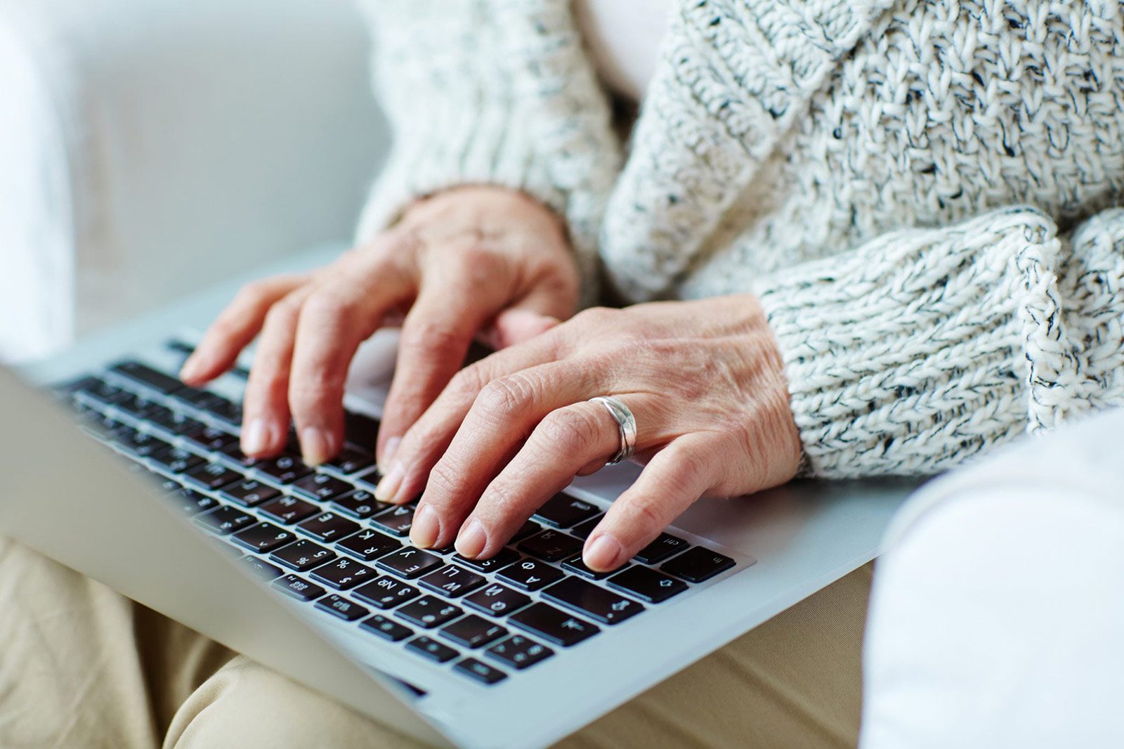 Woman typing on laptop